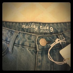 High waisted distressed mom jean